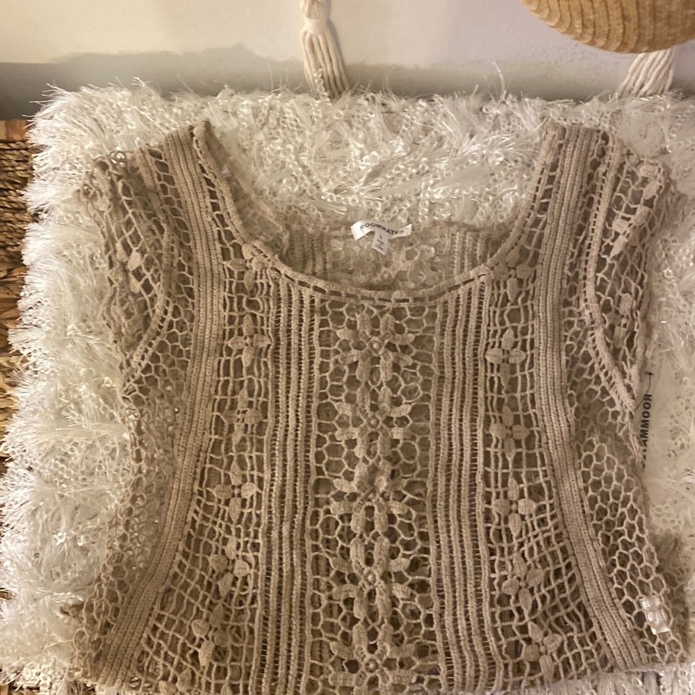 Beige knitted shirt